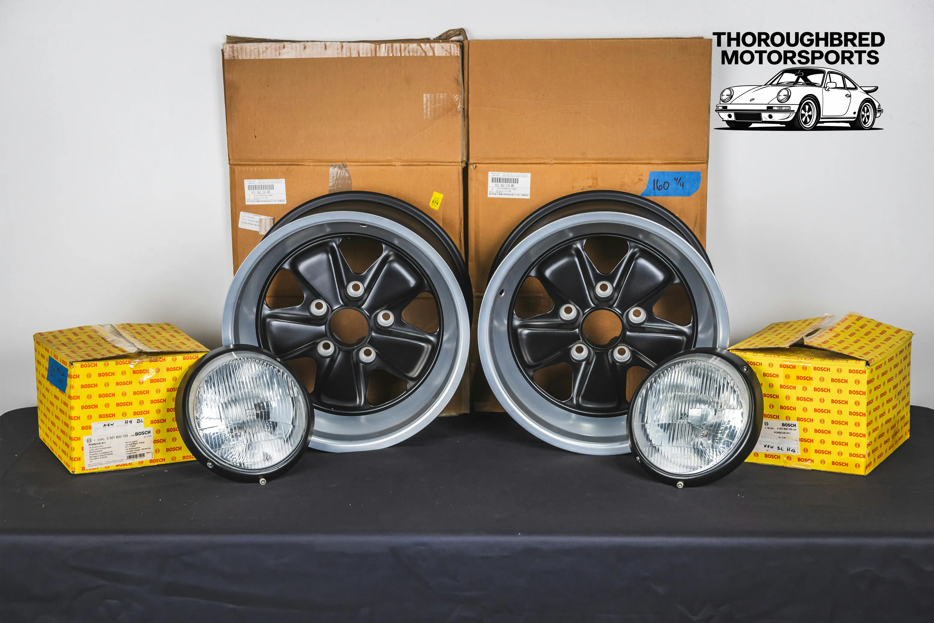 Porsche Fuchs 9x16 NOS (2) and Hella H4 Headlamps (Lot 52)