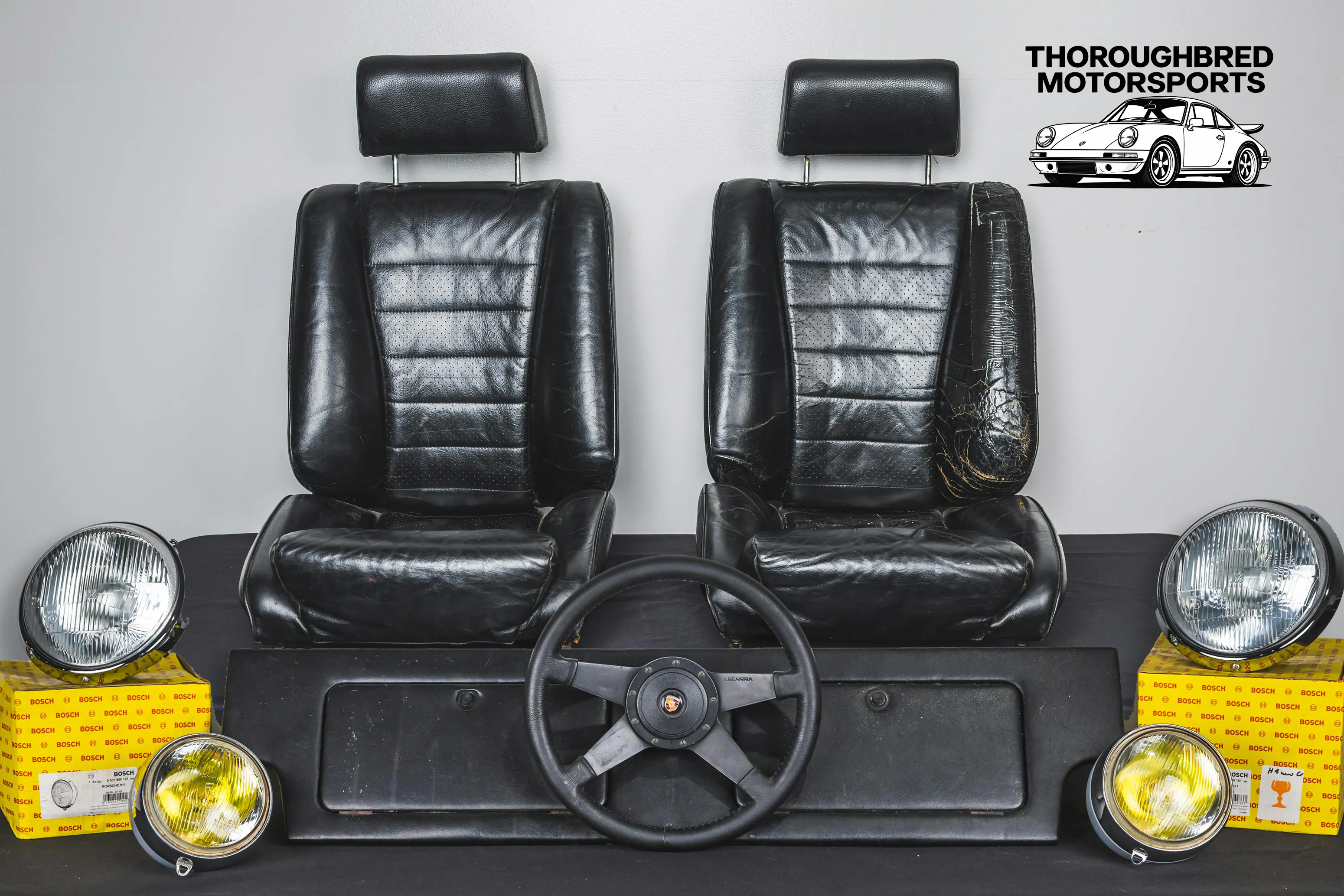 Early 911 Sport Seats, Marchal Pallas Hood Lights, H4 Headlamps, Lecarra Sport Steering Wheel with Hub, and Rear Seat Delete (Lot 10)