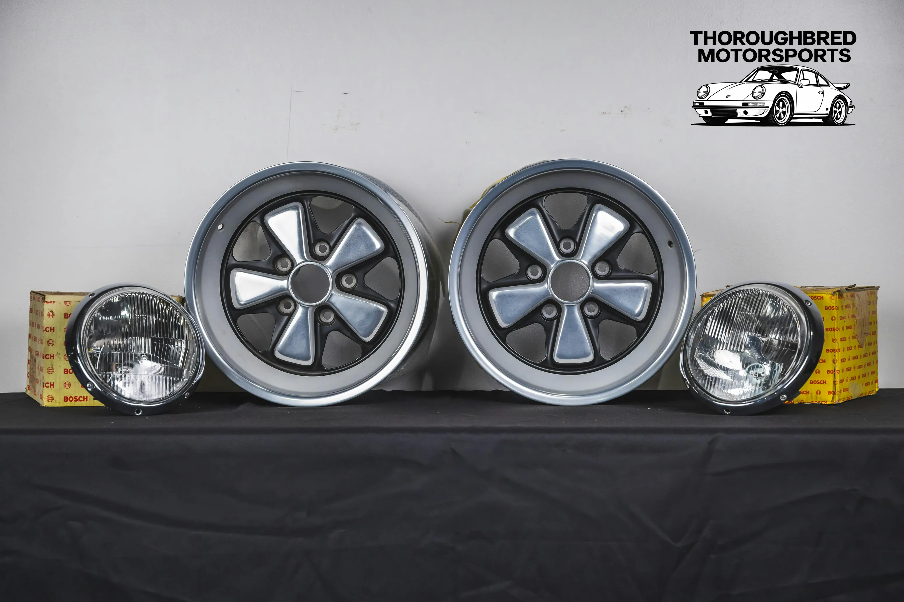 Porsche Fuchs 9x16 Restored (2) and Bosch H1 Headlamps (Lot 53)