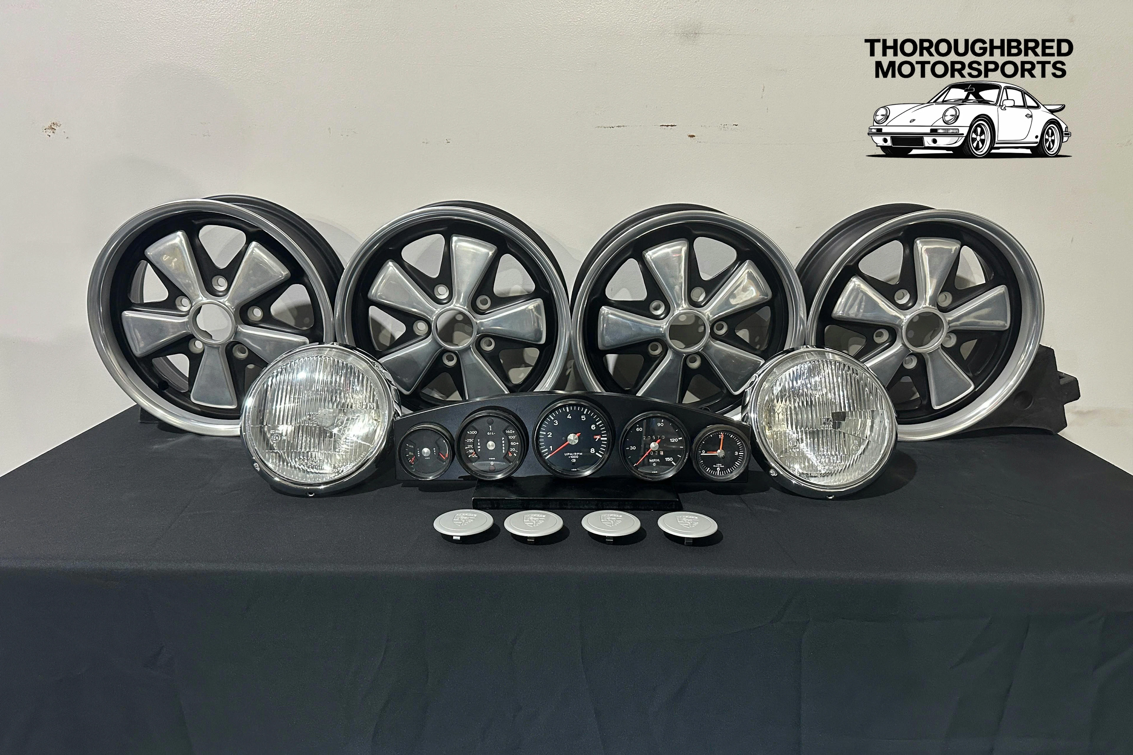 Porsche Fuchs Deep Six 6x15 w/Center Caps, Hella H4 Headlamps, 1973 Porsche 911 Gauge Set (Lot 36)
