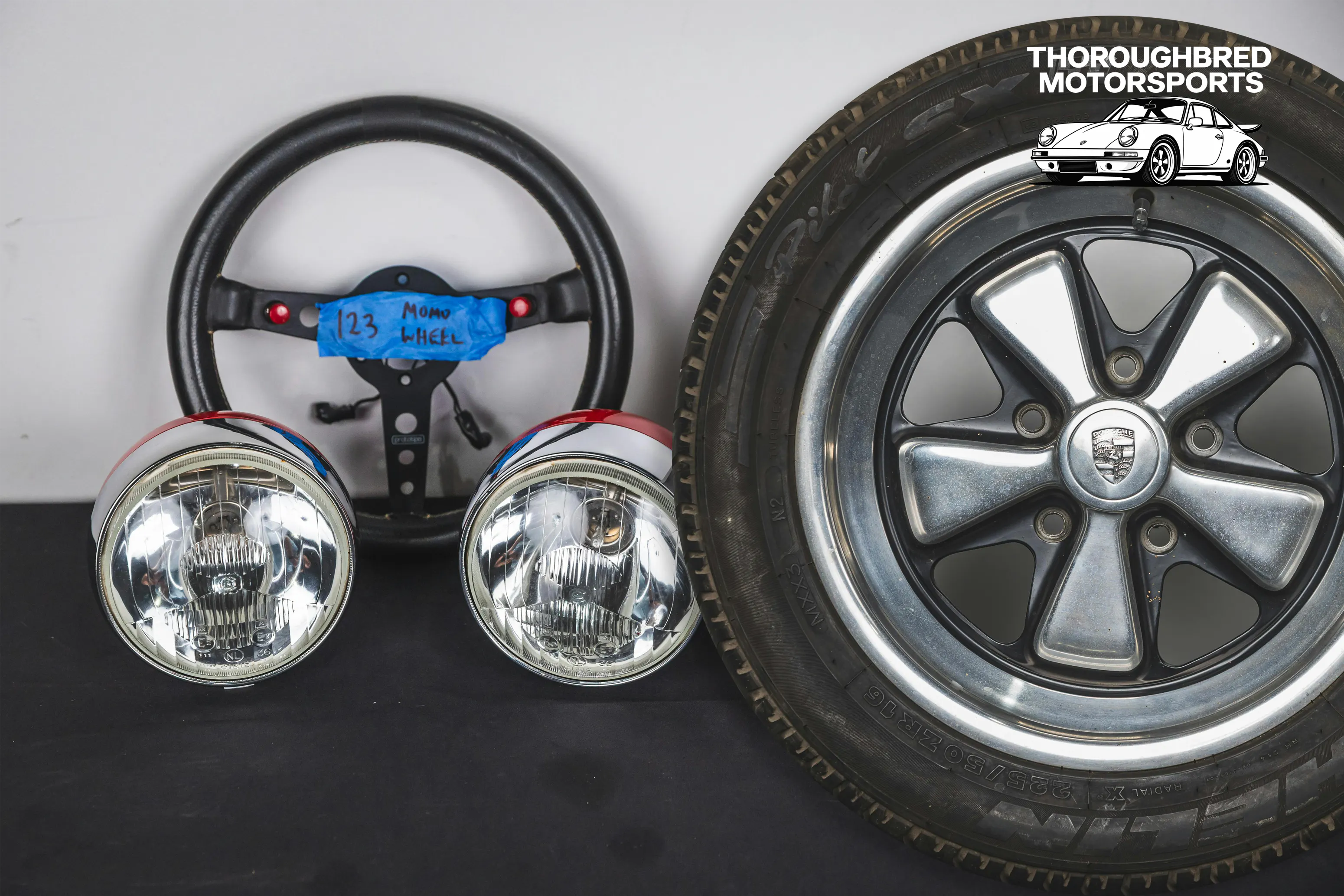 Porsche Fuchs 7x16/8x16, Cibie Driving Lamps and Momo Prototipo Steering Wheel (Lot 40)